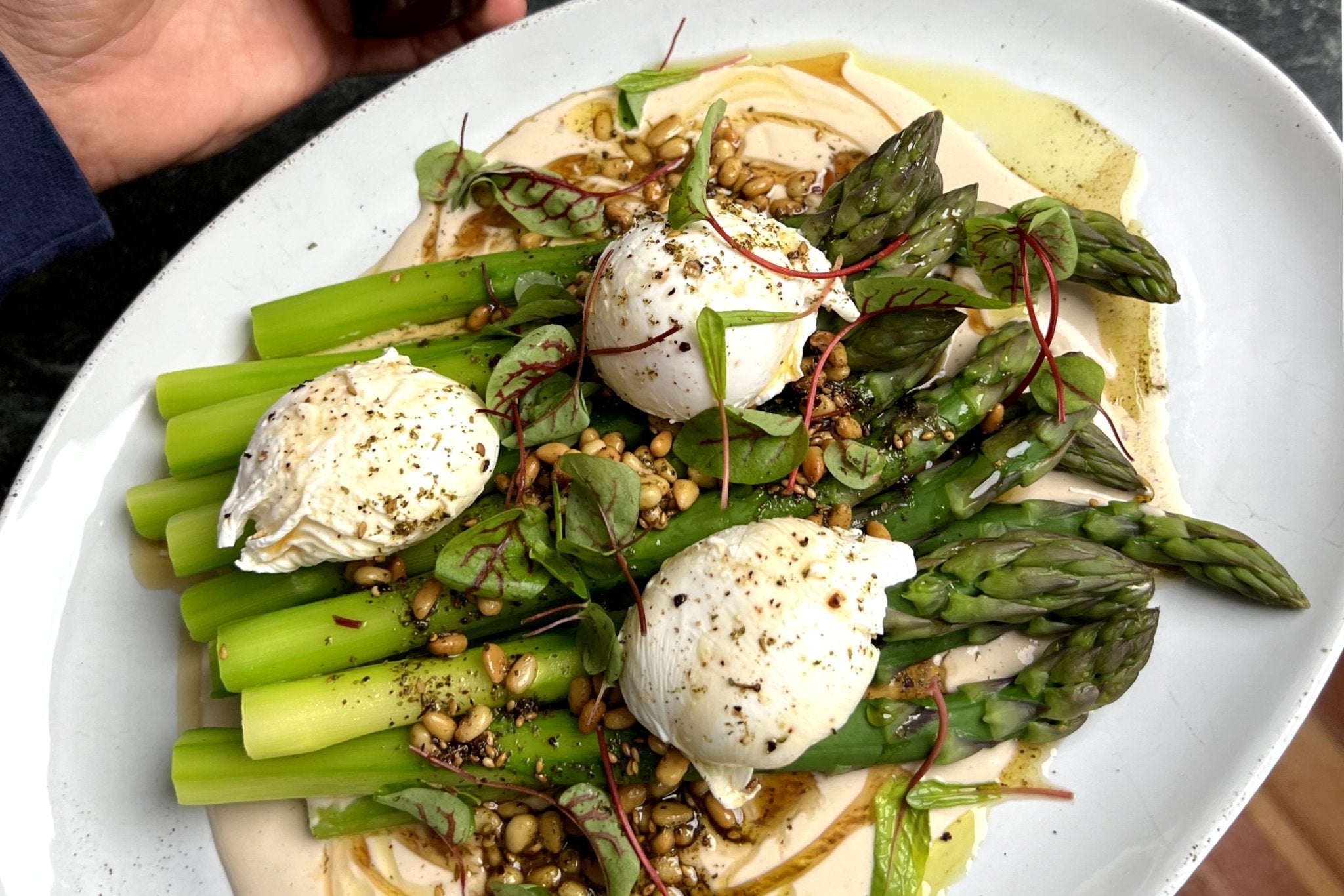 Asparagus and Poached Eggs over Tahini Sauce